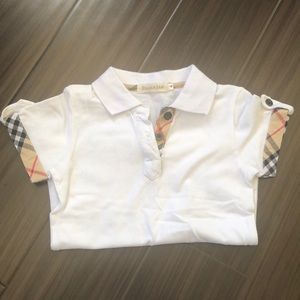 Faux Burberry polo, no stains or holes.